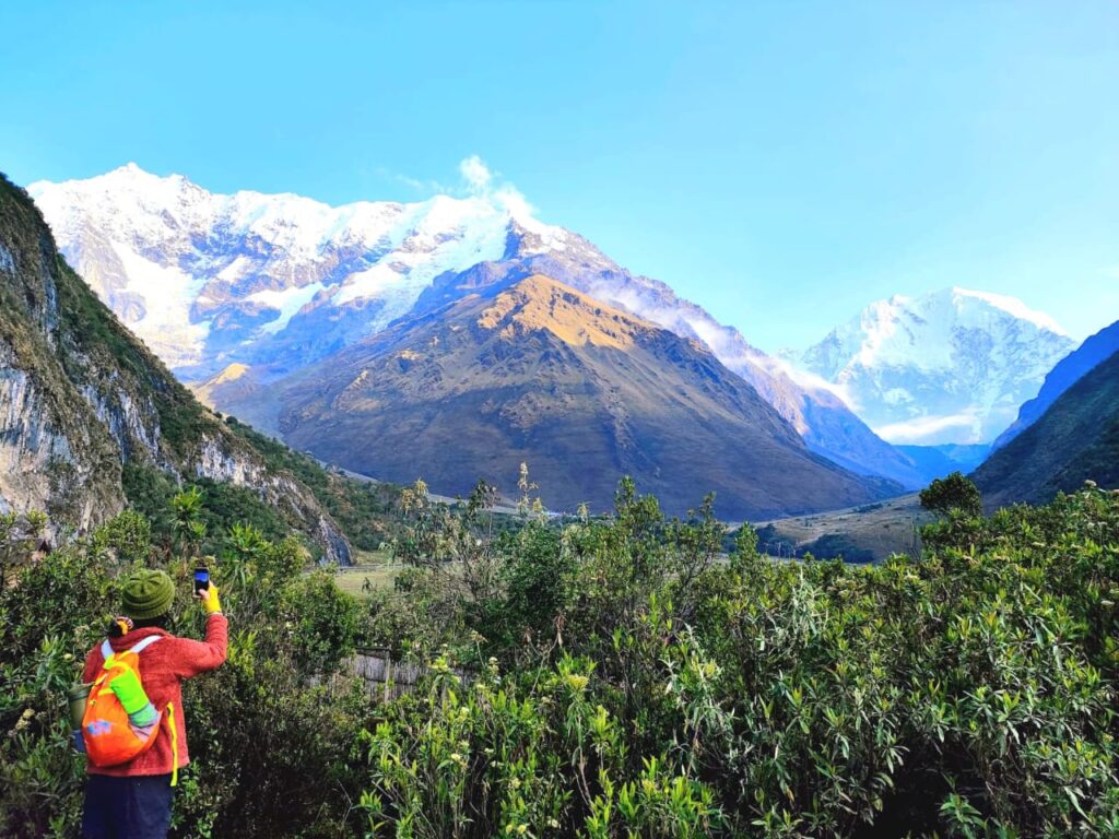 Hikers on the Salkantay trek crossing the Andes with snow-capped peaks and lush valleys – Ali Peru Treks