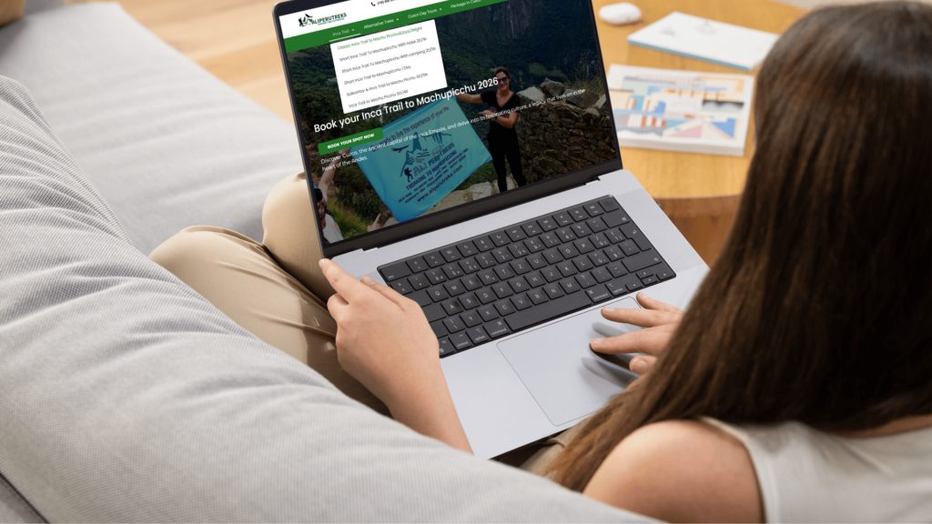 Tourist reviewing Inca Trail Booking Terms and conditions on a laptop, emphasizing transparency - Ali Peru Treks