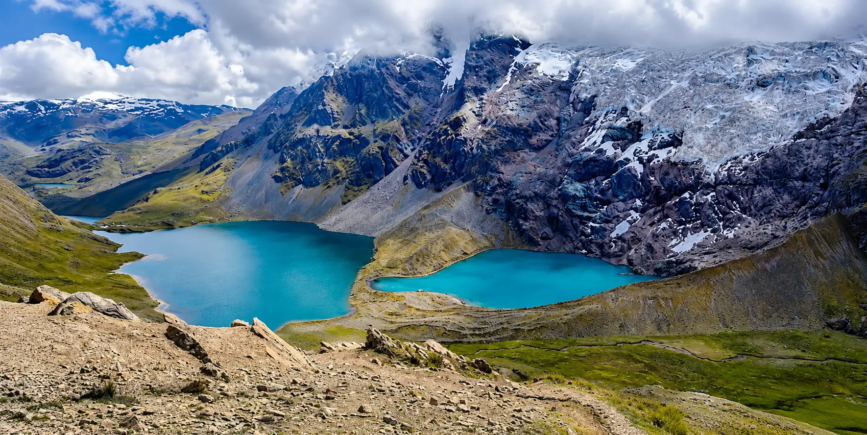 7 Ausangate Lakes, located at the foot of the imposing Ausangate snow-capped mountain in the Vilcanota Range