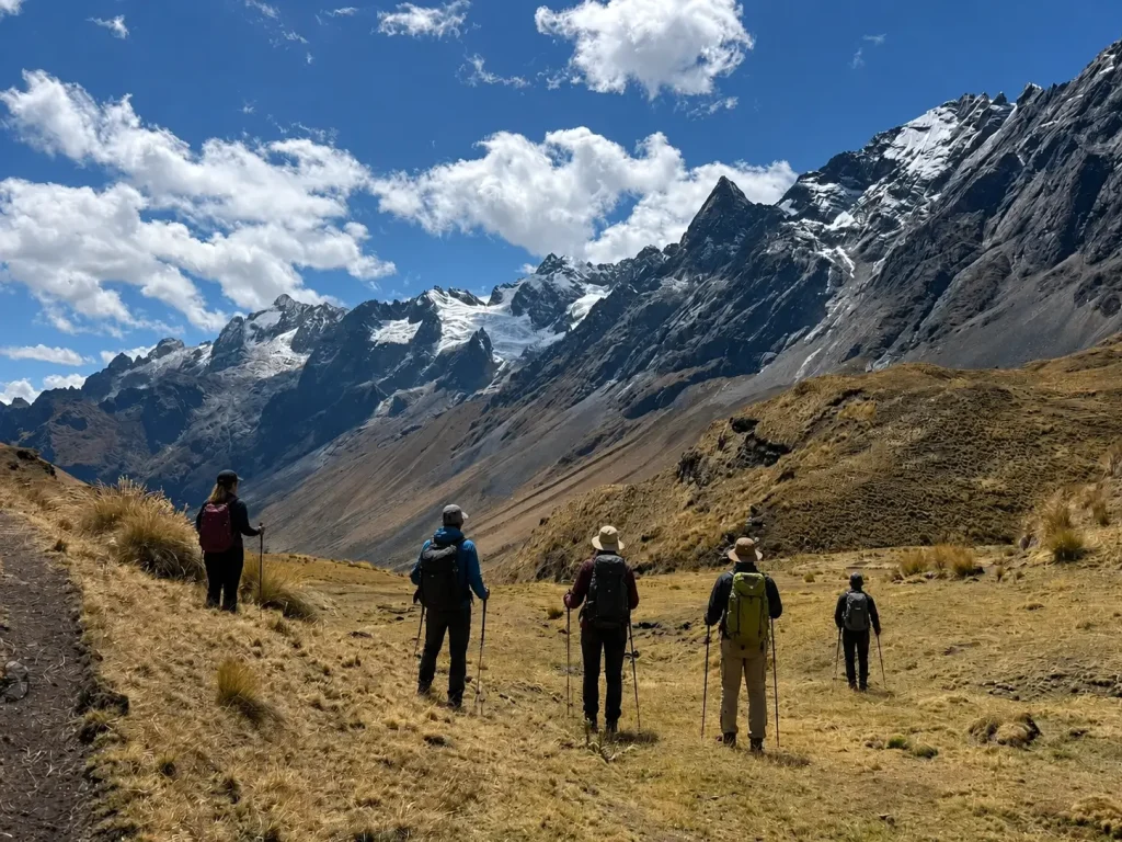 A group of hikers on the Ancascocha trail to Machu Picchu, a route known for its remote, mountainous Andean landscapes