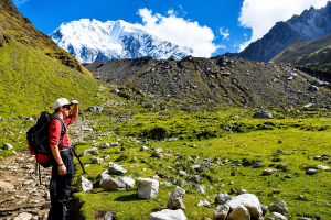 A hiker gazing at the imposing snow-capped Salkantay