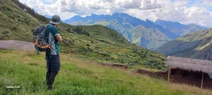 Hiker Admiring Sweeping Andean Views