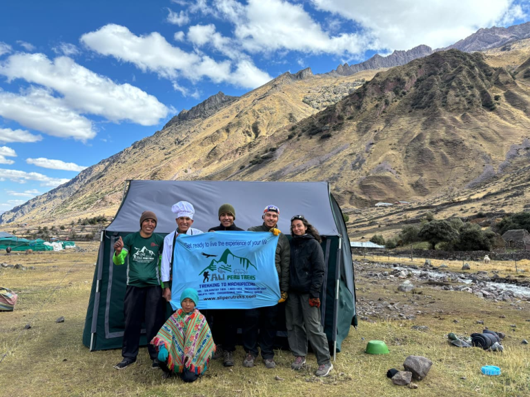 Mountainous terrain and camping in a tent—this is a high-altitude campsite, common along these routes on the Lares Trek