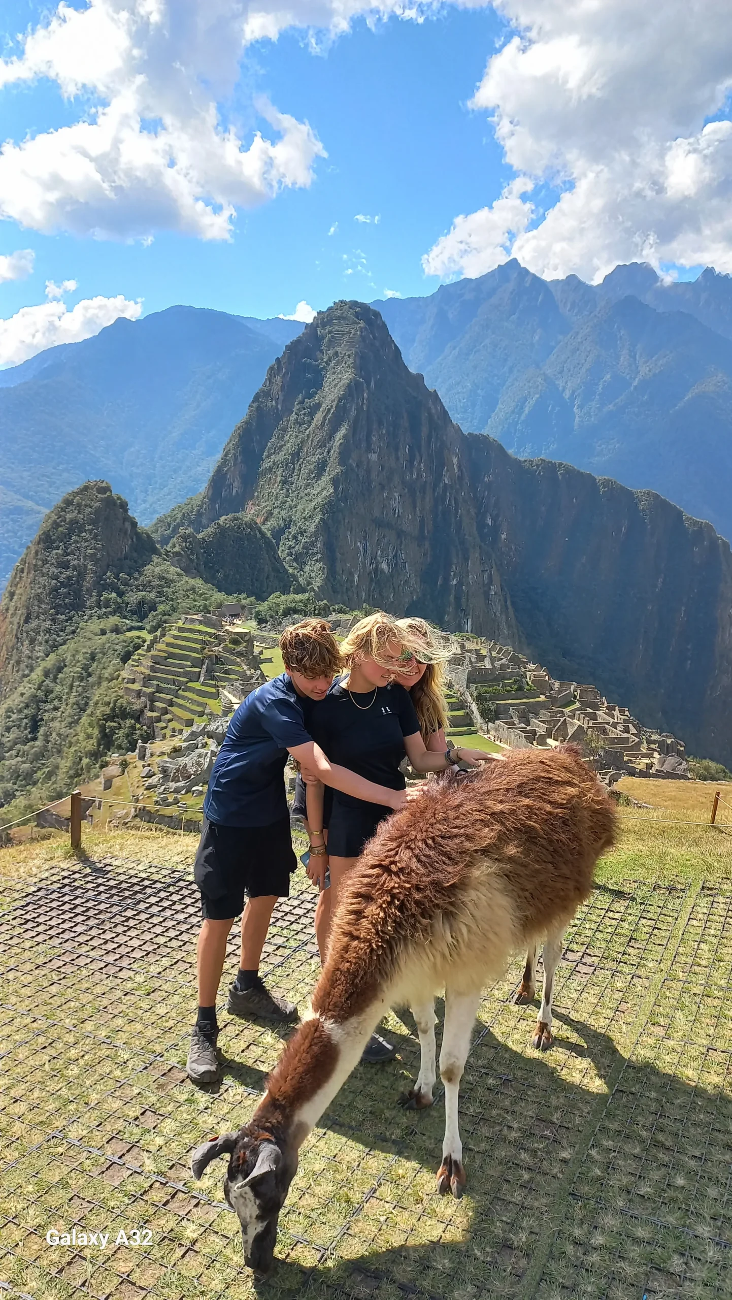 The Inca Citadel of Machu Picchu with Children