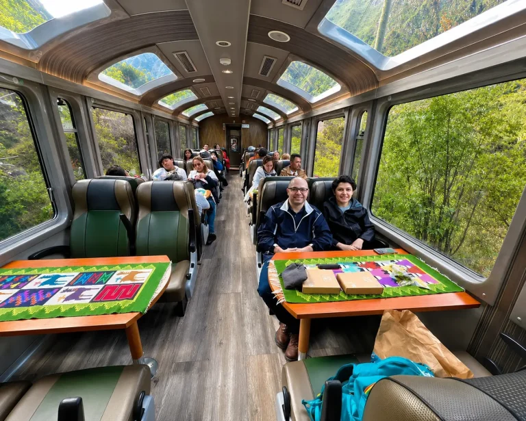 The interior of PeruRail's Vistadome train, known for its large panoramic windows and glass roofs that offer immersive views of the landscape