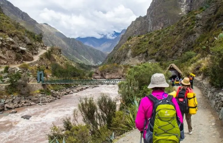 Hikers at the first checkpoint, with the Urubamba River in the background.
