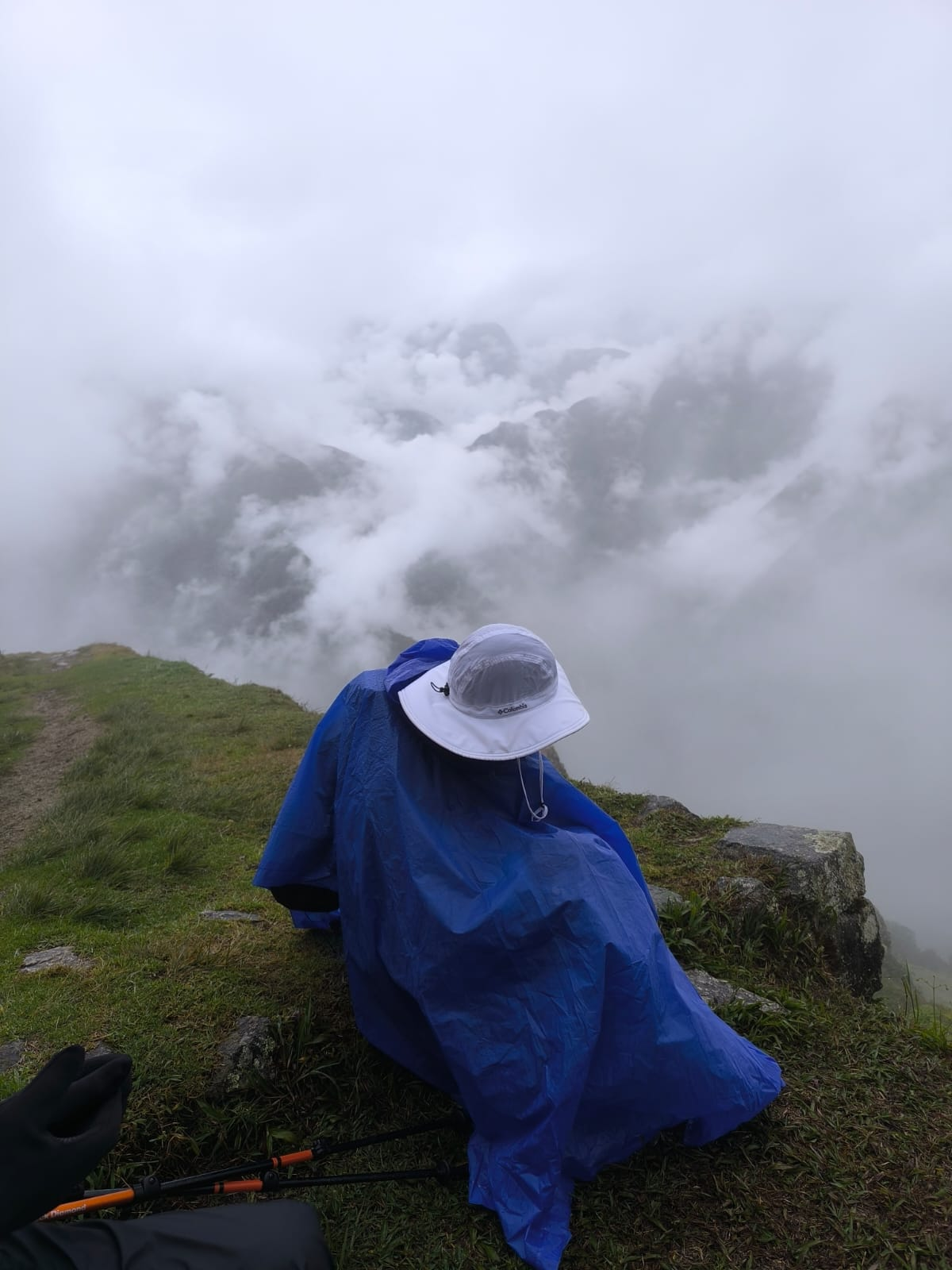 Hikers wearing rain jackets and ponchos on the Inca Trail